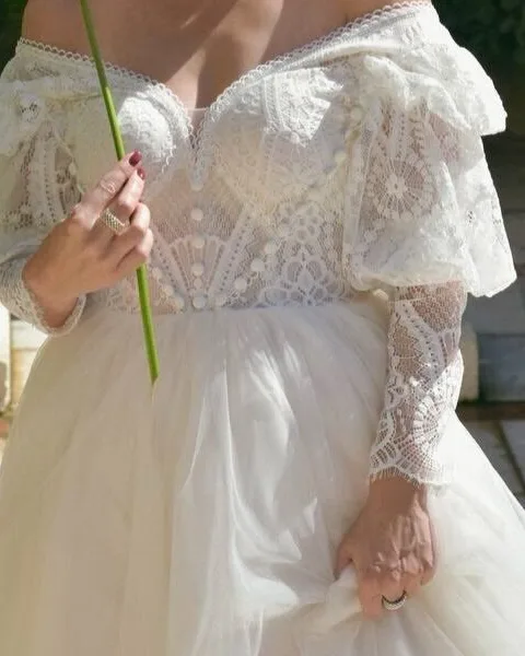 Pearl-button lace bodice detail