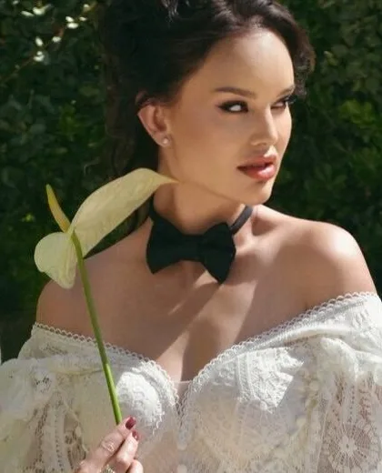 Portrait with calla lily and black silk bow